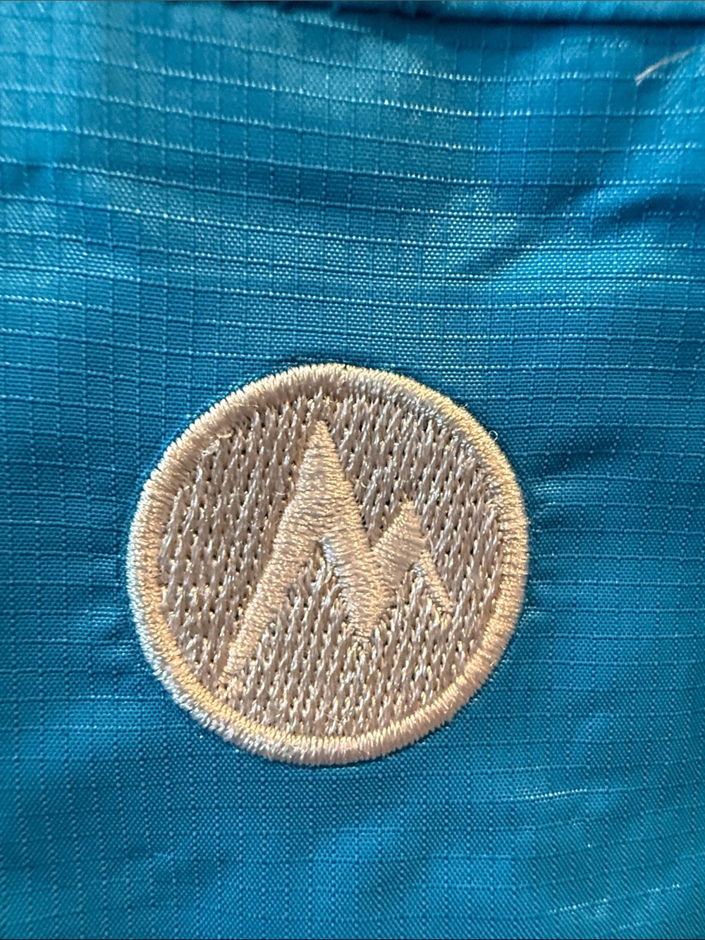Marmot women’s turquoise/Blue Hooded Rain Jacket - Picture 9 of 11